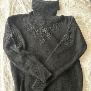 Black turtleneck sweater